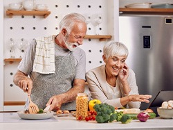 Senior couple preparing a healthy meal together