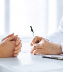 Dental insurance form on clipboard