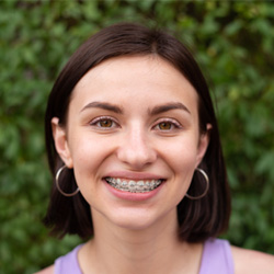 Portrait of smiling young woman with braces