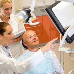 Male patient learning about the full mouth reconstruction process