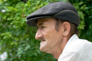 Portrait of senior man experiencing facial collapse